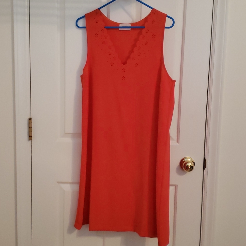Sleeveless, red dress with v-neck cut-out design